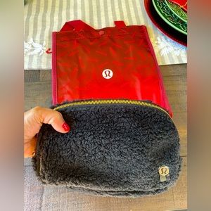 Lululemon Black Fleece Everywhere Bag. NWT. Comes with red holiday Lulu bag.